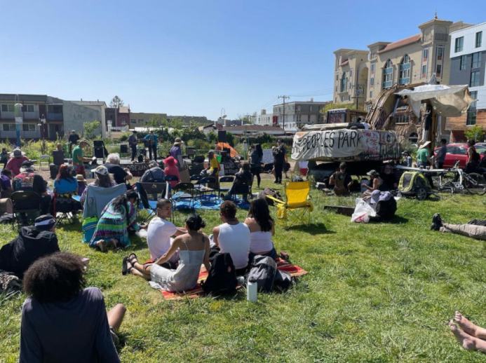 People sitting in park on sunny day